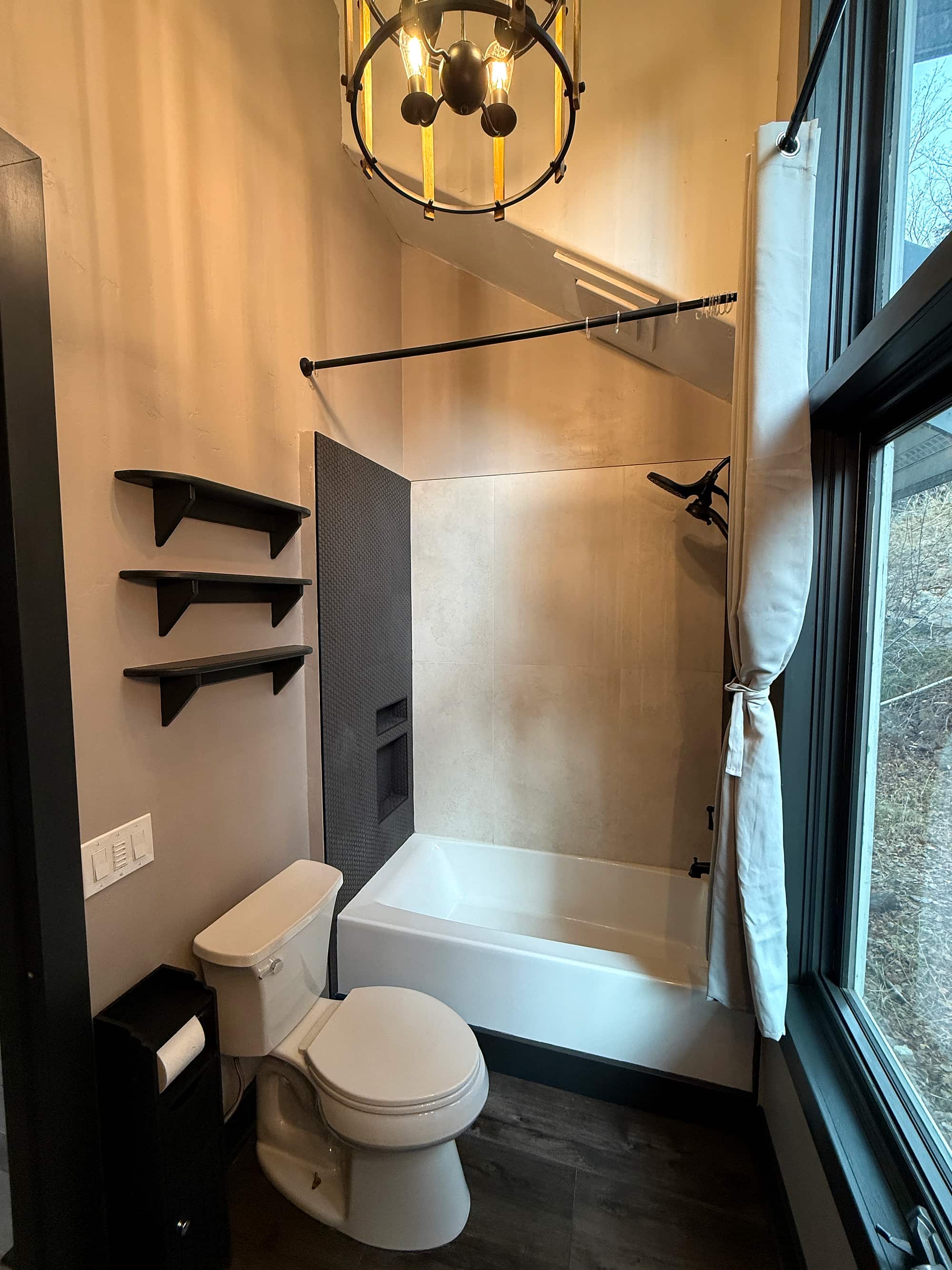 The bath, with tub and shower